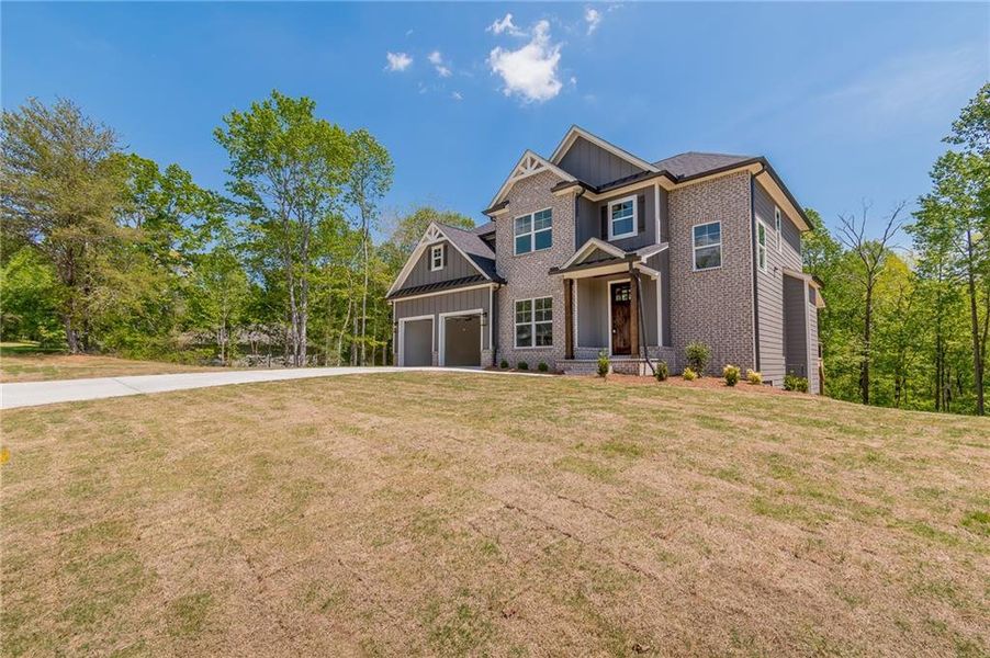 Front exterior of a new home in , Gainesville, GA, highlighting curb appeal (Image 22).