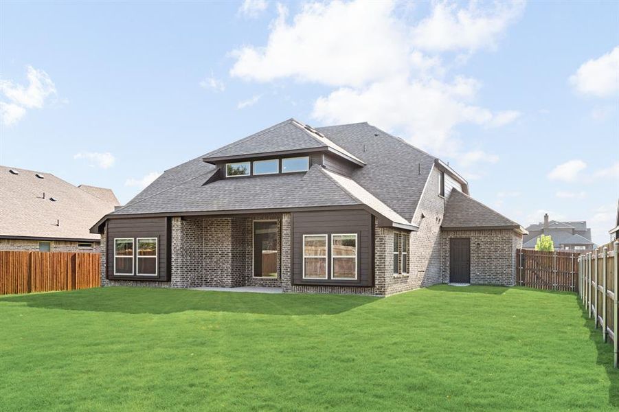 Front exterior of a new home in Sunrise at Garden Valley 60-79, Waxahachie, TX, highlighting curb appeal (Image 24). Front exterior of a new home in Sunrise at Garden Valley 60-79, Waxahachie, TX, highlighting curb appeal (Image 24).