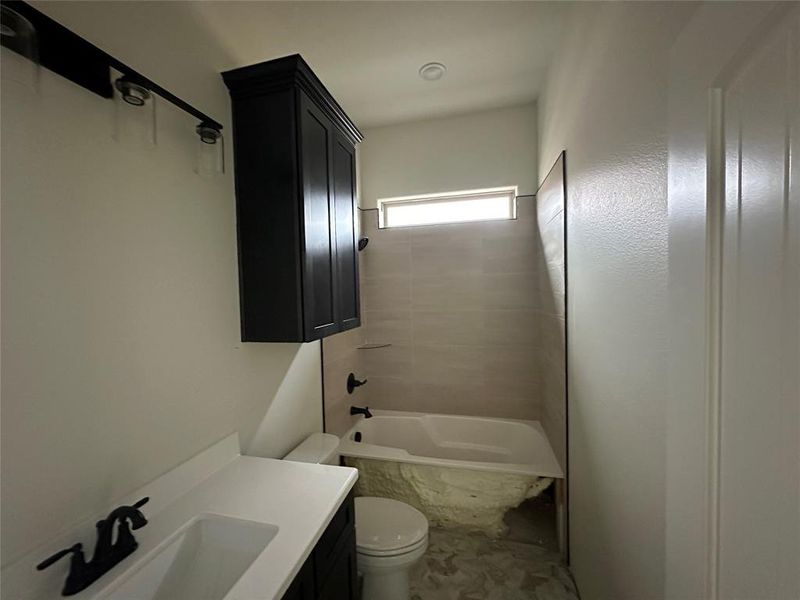 Bathroom featuring vanity and bathtub / shower combination