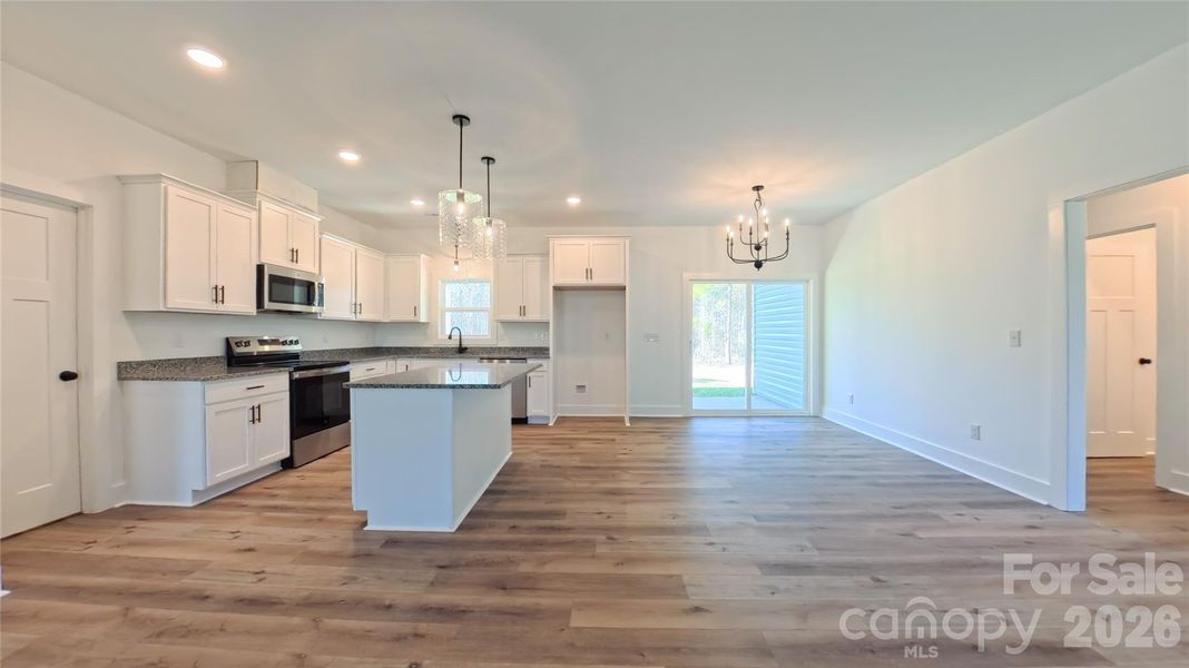 Kitchen and dining area Kitchen and dining area
