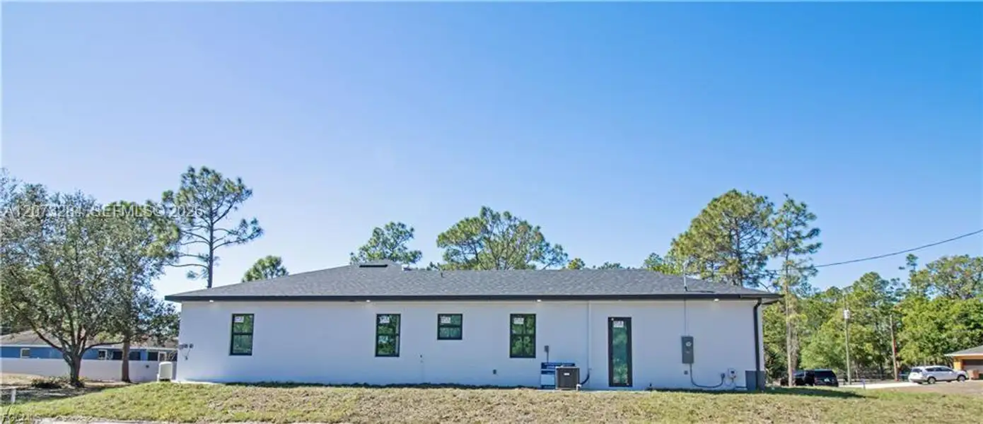 Exterior details and patio area of a home in , Lehigh Acres (Image 3).
