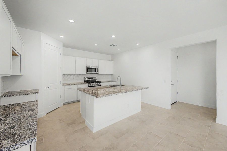 Furnished interior view inside a new home in Bella Vista Farms, San Tan Valley (Image 3).