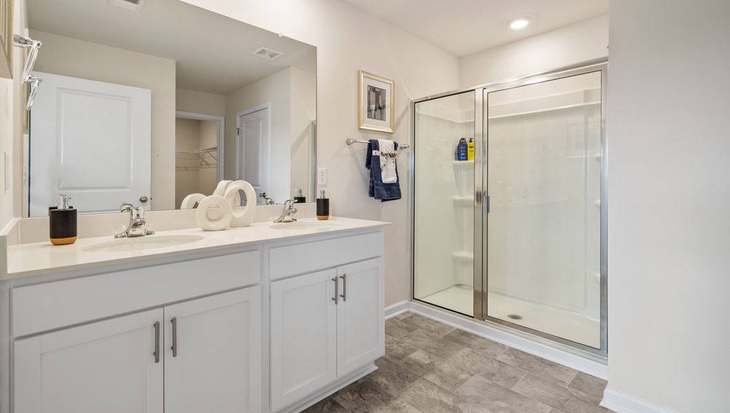 Representative furnished interior of a home built from the Cali by D.R. Horton in Lakestone, Woodruff (Image 23).