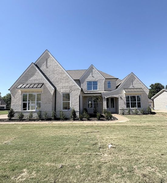 Stone veneer exterior with multiple gables Stone veneer exterior with multiple gables
