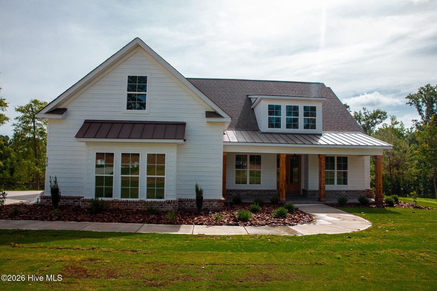 Front exterior of a new home in Marshall Mills, Grovetown, GA, highlighting curb appeal (Image 1). Front exterior of a new home in Marshall Mills, Grovetown, GA, highlighting curb appeal (Image 1).