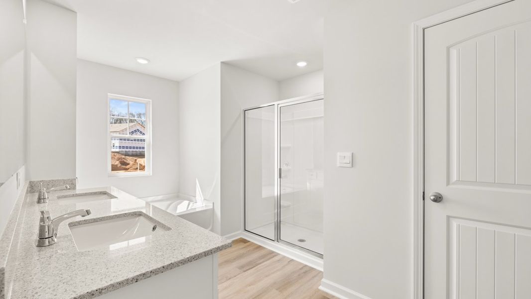 Representative furnished interior of a home built from the Hayden by D.R. Horton in Liberty Crossing, Braselton (Image 10).