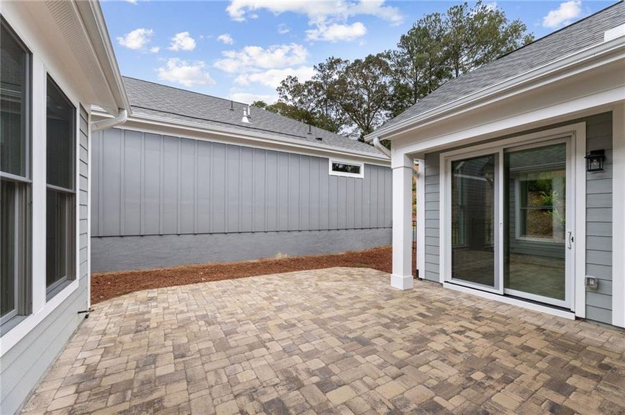 Exterior details and patio area of a home in The Courtyards at Bailey Farm, Dacula (Image 2).