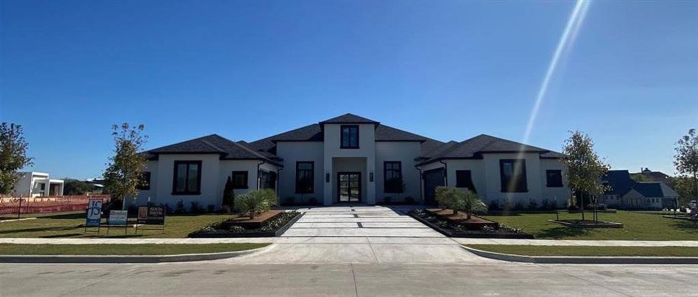 View of front of home with a front lawn