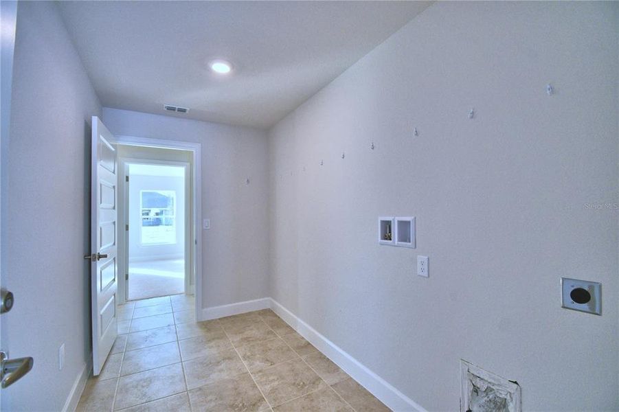 Spacious, unfurnished interior of a new home in Cadence Crossing, Auburndale (Image 20).