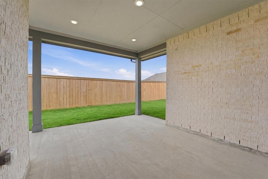 Exterior details and patio area of a home in Bridgeland, Cypress (Image 17).
