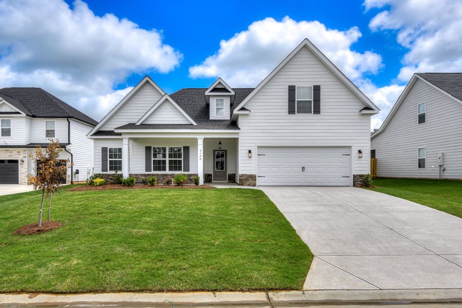 Front exterior of a new home in The Sanctuary, Aiken, SC, highlighting curb appeal (Image 1). Front exterior of a new home in The Sanctuary, Aiken, SC, highlighting curb appeal (Image 1).