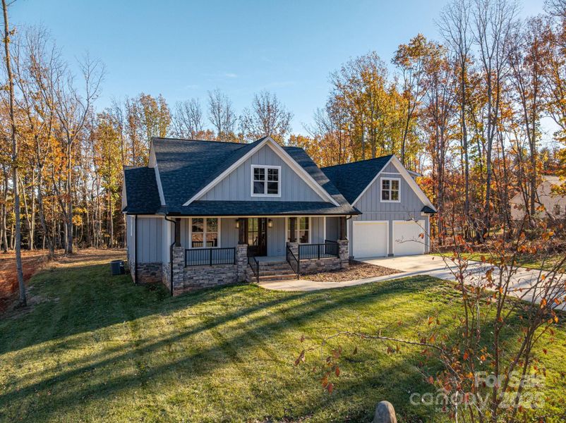Front exterior of a new home in , Lincolnton, NC, highlighting curb appeal (Image 1).