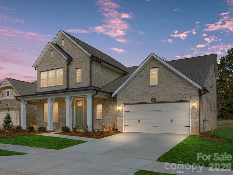 Front exterior of a new home in , Mint Hill, NC, highlighting curb appeal (Image 18). Front exterior of a new home in , Mint Hill, NC, highlighting curb appeal (Image 18).