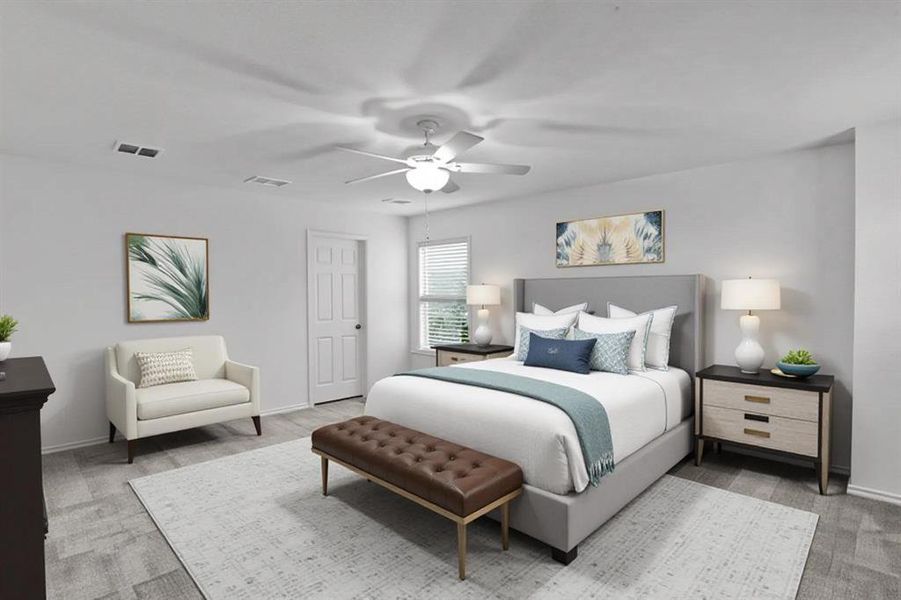 Spacious room featuring wood-finish flooring, a ceiling fan, and window blinds
