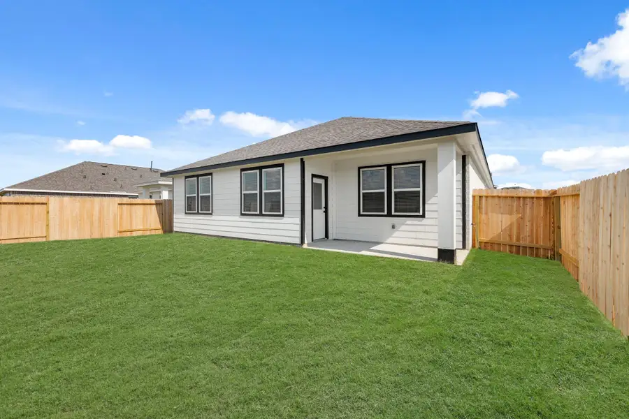 Backyard with covered patio Backyard with covered patio