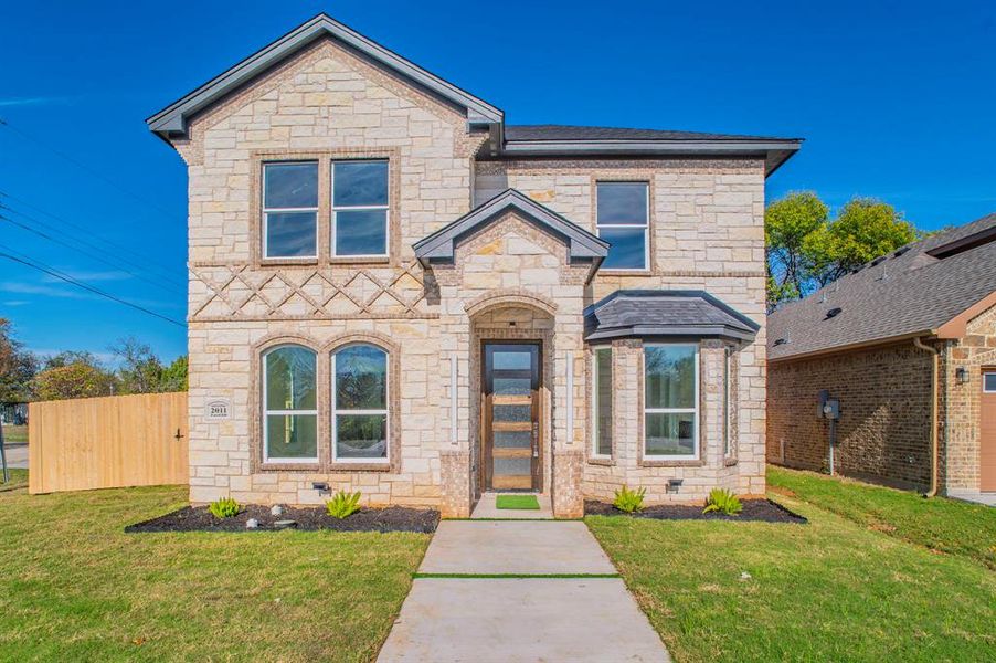 French country style house with stone siding French country style house with stone siding