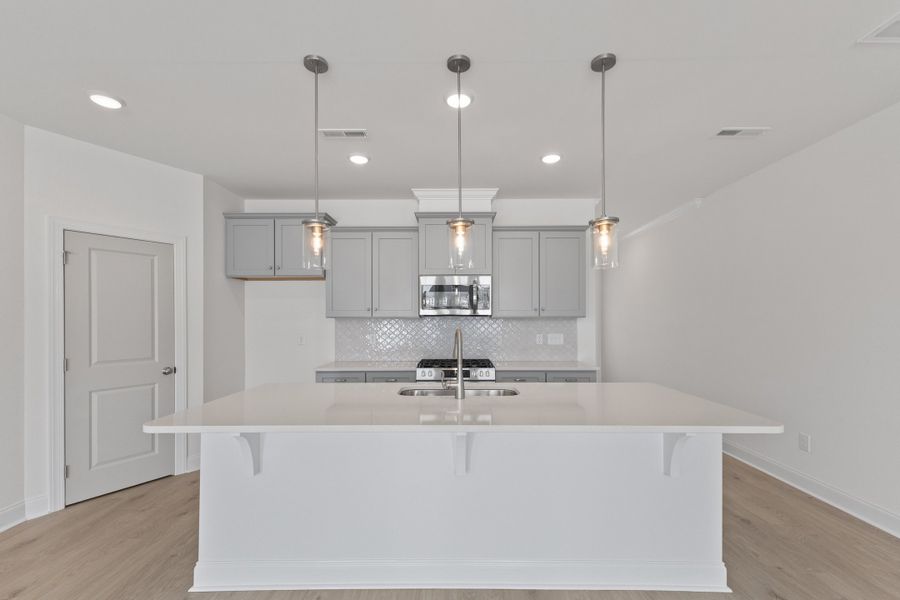 Representative furnished interior of a home built from the The Hemlock by RobuckHomes in Kennebec Crossing, Angier (Image 84).