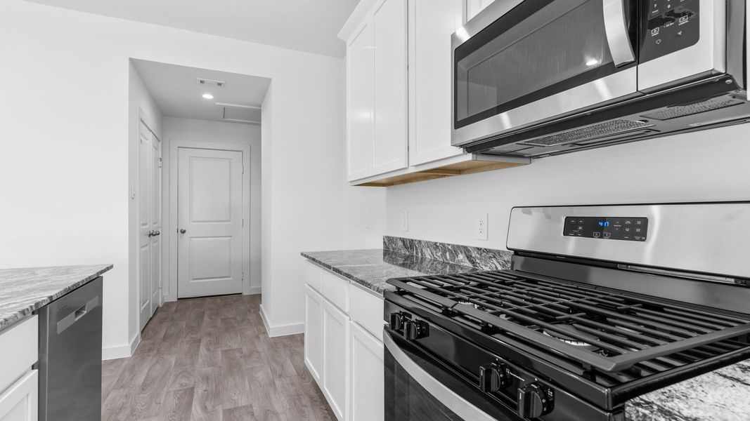 Furnished interior view inside a new home in Tamarron, Fulshear (Image 12).