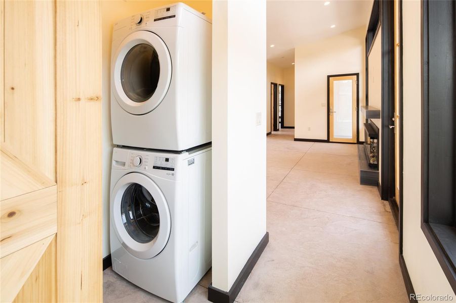 stacked full w/d behind barn door