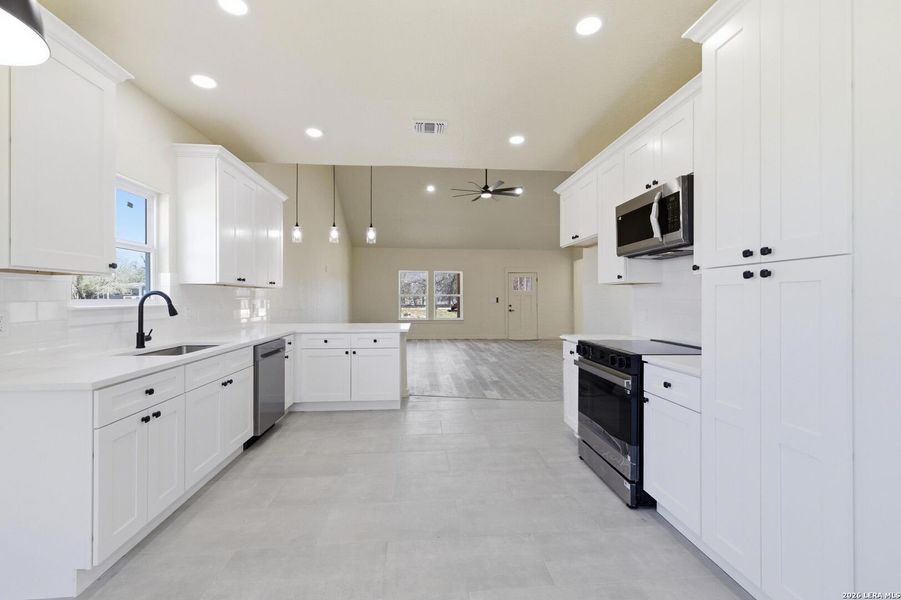Furnished interior view inside a new home in , Floresville (Image 9).
