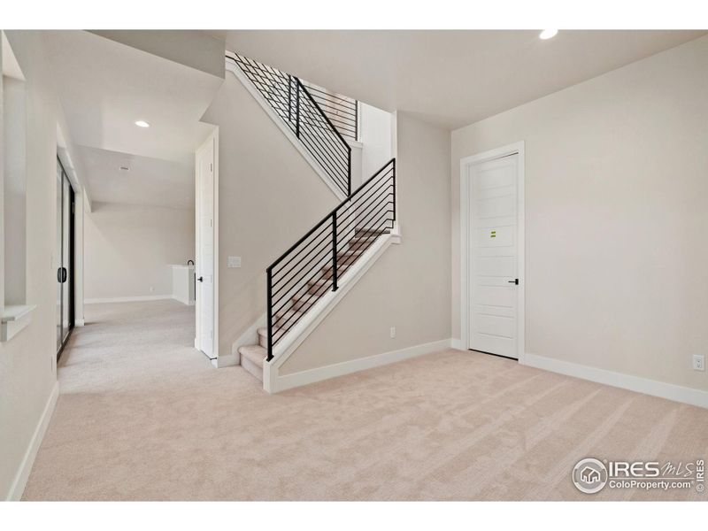 Spacious, unfurnished interior of a new home in The Fairways at RainDance, Windsor (Image 11).