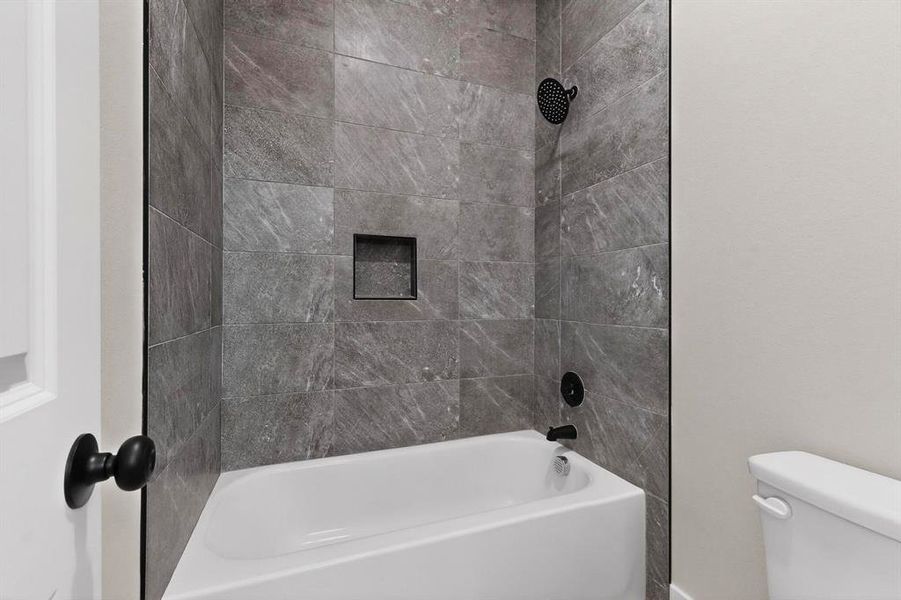 Jack and Jill Bathroom shared by two of the secondary bedrooms Jack and Jill Bathroom shared by two of the secondary bedrooms