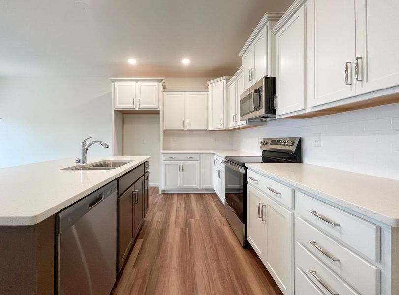 Furnished interior view inside a new home in Bellevue Townhomes, Greenville (Image 8).