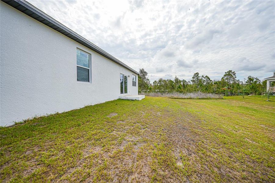 Exterior details and patio area of a home in , Port Charlotte (Image 31).