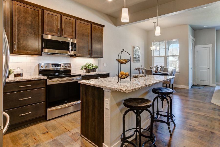 Representative furnished interior of a home built from the The Camden by Landmark Homes in The Lakes at Centerra, Loveland (Image 15). Representative furnished interior of a home built from the The Camden by Landmark Homes in The Lakes at Centerra, Loveland (Image 15).
