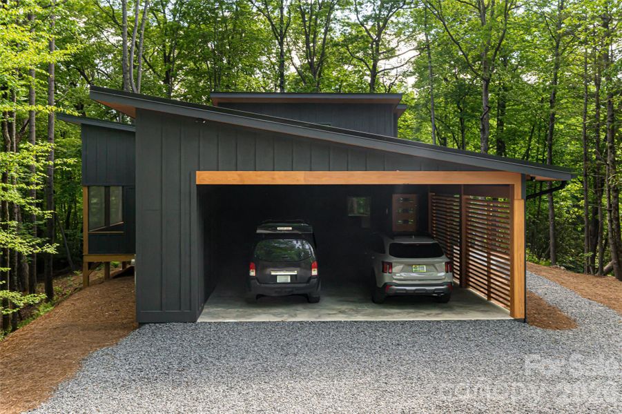 Exterior details and patio area of a home in , Pisgah Forest (Image 28).