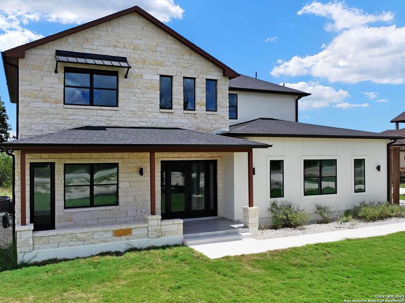 Front exterior of a new home in , Spring Branch, TX, highlighting curb appeal (Image 25).