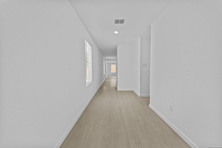 Spacious, unfurnished interior of a new home in Hidden Oasis, San Antonio (Image 16). Spacious, unfurnished interior of a new home in Hidden Oasis, San Antonio (Image 16).