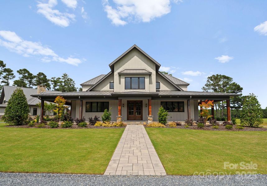 Front exterior of a new home in , Pinehurst, NC, highlighting curb appeal (Image 25).