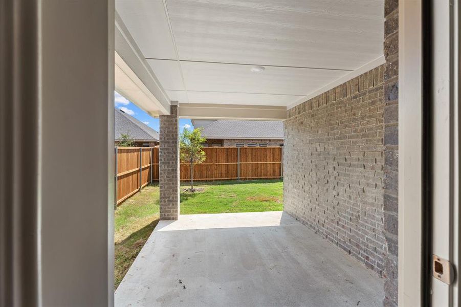 Exterior details and patio area of a home in Williamsburg, Fate (Image 25).