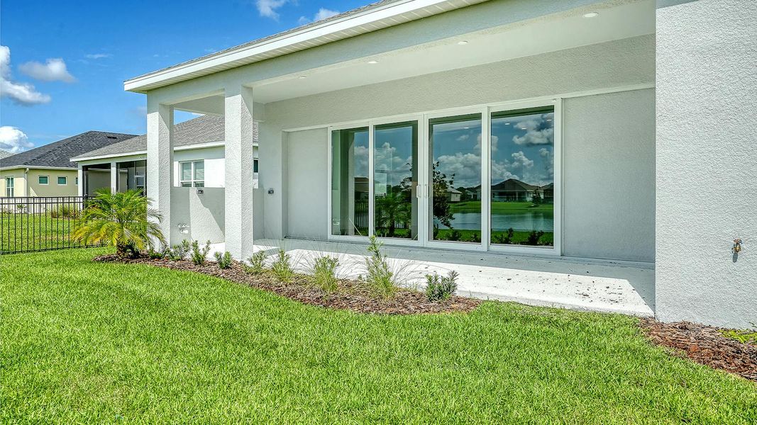 Exterior details and patio area of a home in Canoe Creek Real Estate and Homes for Sale in Parrish, FL - Neal Communities, Parrish (Image 22). Exterior details and patio area of a home in Canoe Creek Real Estate and Homes for Sale in Parrish, FL - Neal Communities, Parrish (Image 22).