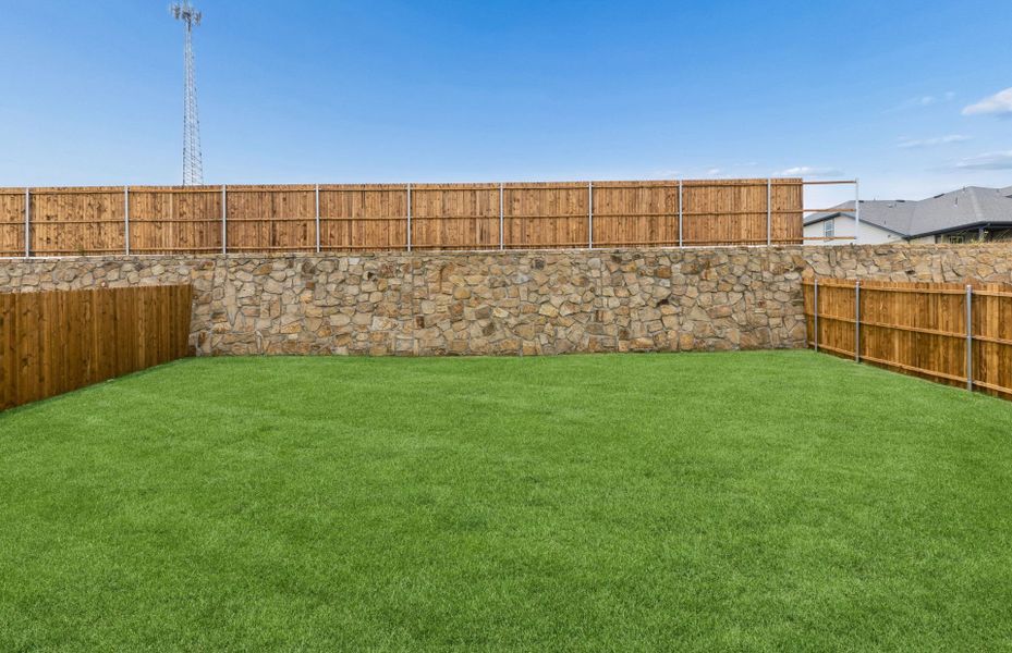 Exterior details and patio area of a home in Rosemary Fields, Godley (Image 2).