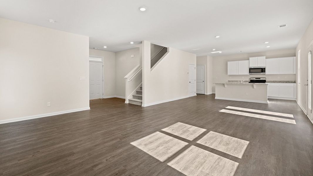 Representative unfurnished interior of a home built from the FLORA by D.R. Horton in Thompson Ridge, Dallas (Image 13). Representative unfurnished interior of a home built from the FLORA by D.R. Horton in Thompson Ridge, Dallas (Image 13).
