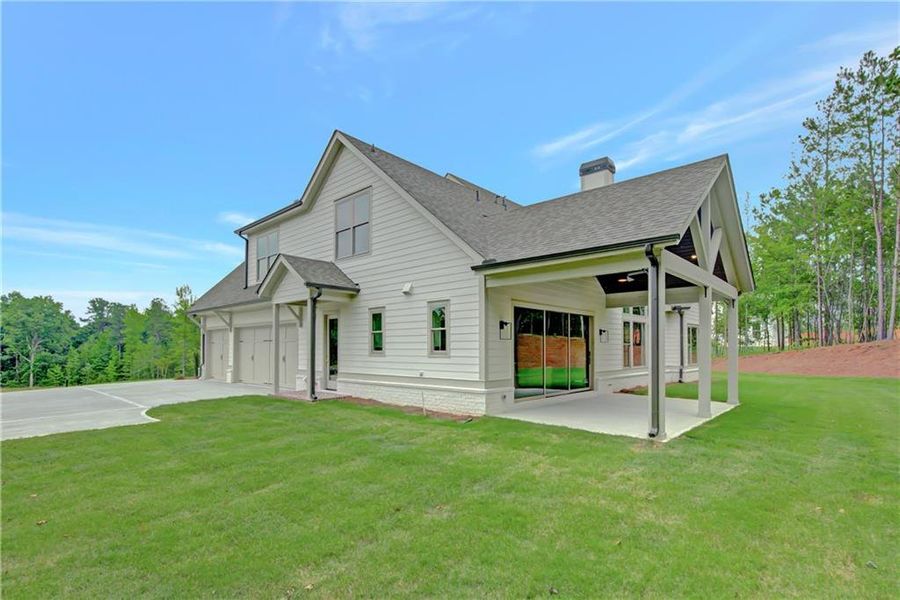 Front exterior of a new home in , Newnan, GA, highlighting curb appeal (Image 28). Front exterior of a new home in , Newnan, GA, highlighting curb appeal (Image 28).