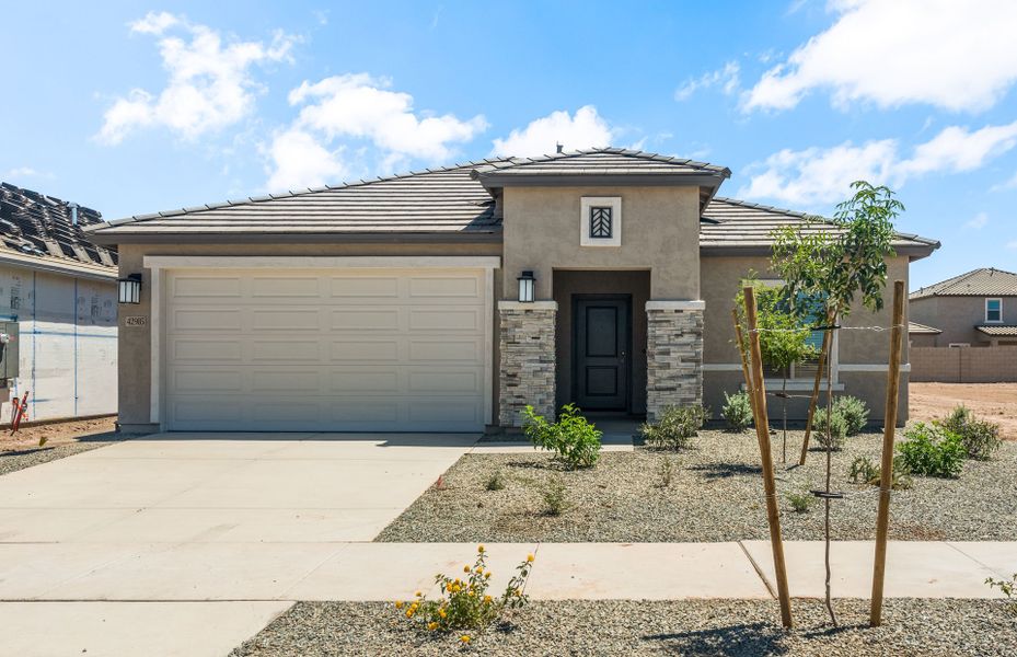 Front exterior of a new home in El Rancho Santa Rosa, Maricopa, AZ, highlighting curb appeal (Image 16).