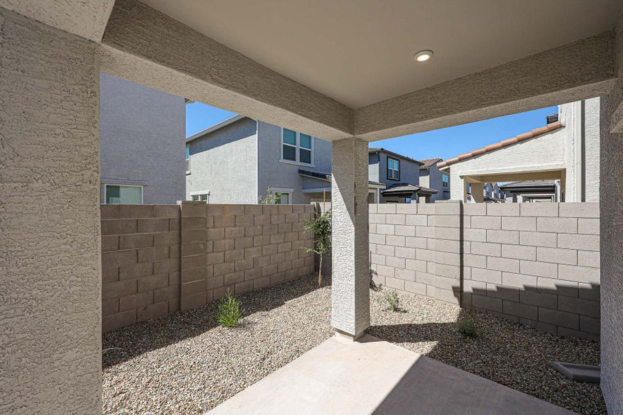 A stone patio with a stone wall and a stone patio with a stone patio and a brick wall. A stone patio with a stone wall and a stone patio with a stone patio and a brick wall.