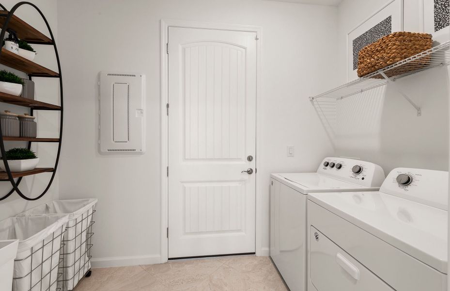 Spacious utility room with washer and dryer