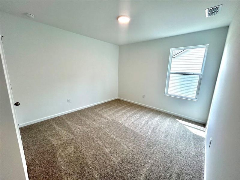 Spacious, unfurnished interior of a new home in The Pointe at Heron Bay, Locust Grove (Image 22).