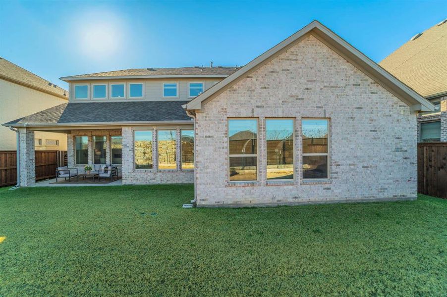 Exterior details and patio area of a home in The Ridge at Northlake, Northlake (Image 3).