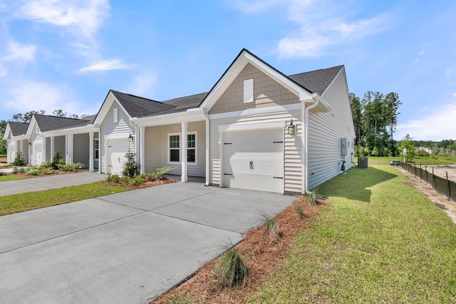 Front exterior of a new home in , Summerville, SC, highlighting curb appeal (Image 2). Front exterior of a new home in , Summerville, SC, highlighting curb appeal (Image 2).