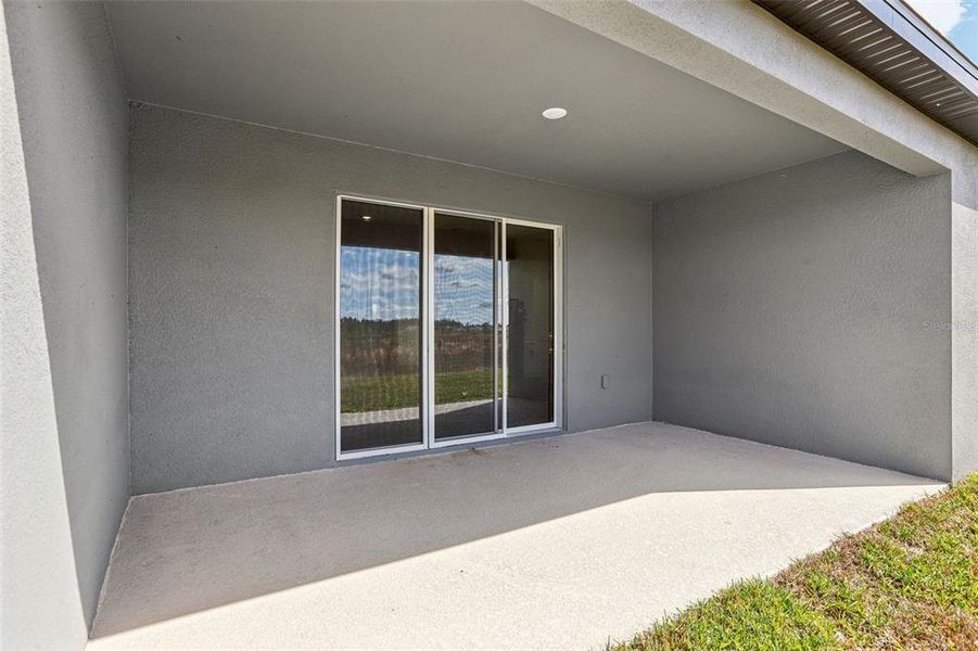 Exterior details and patio area of a home in Two Rivers - Signature Series, Zephyrhills (Image 26). Exterior details and patio area of a home in Two Rivers - Signature Series, Zephyrhills (Image 26).