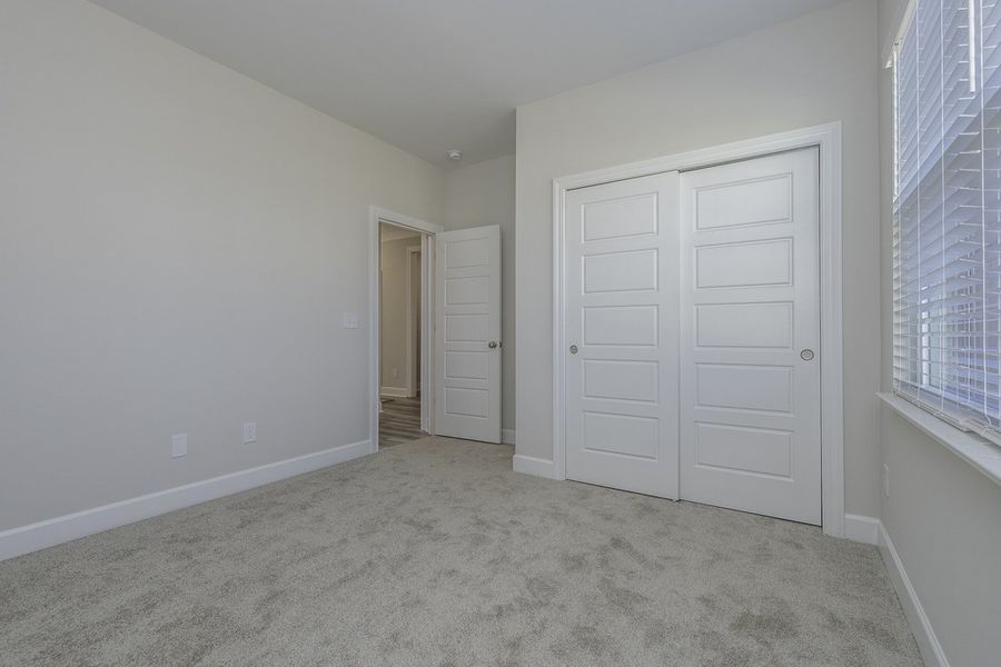 Representative unfurnished interior of a home built from the The Hunter by Cothran Homes in Holly Ridge, Greenville (Image 18).