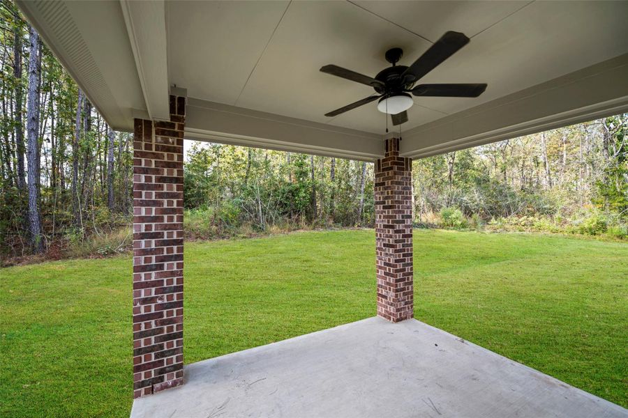 Exterior details and patio area of a home in Oakwood Ranch, Willis (Image 3). Exterior details and patio area of a home in Oakwood Ranch, Willis (Image 3).