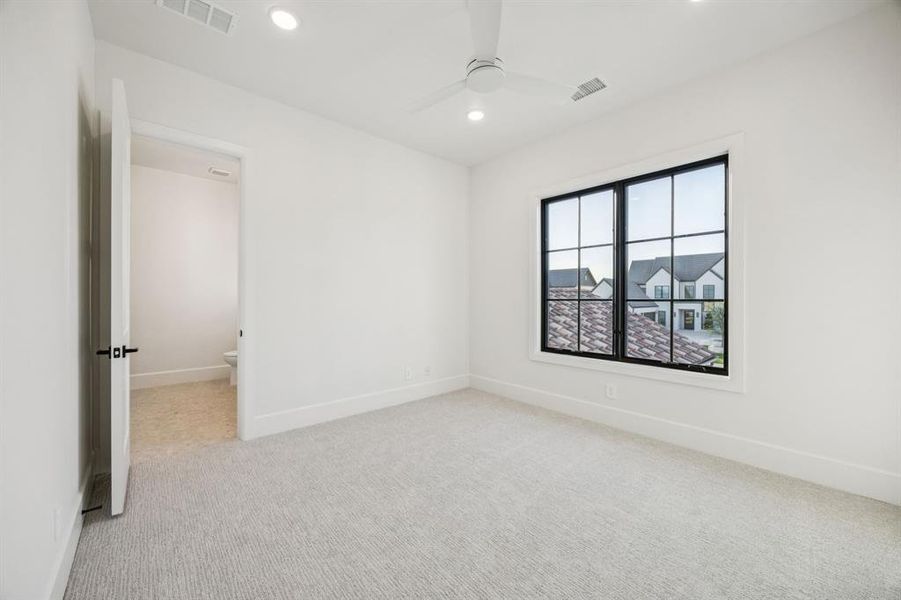 Carpeted spare room with ceiling fan and recessed lighting Carpeted spare room with ceiling fan and recessed lighting