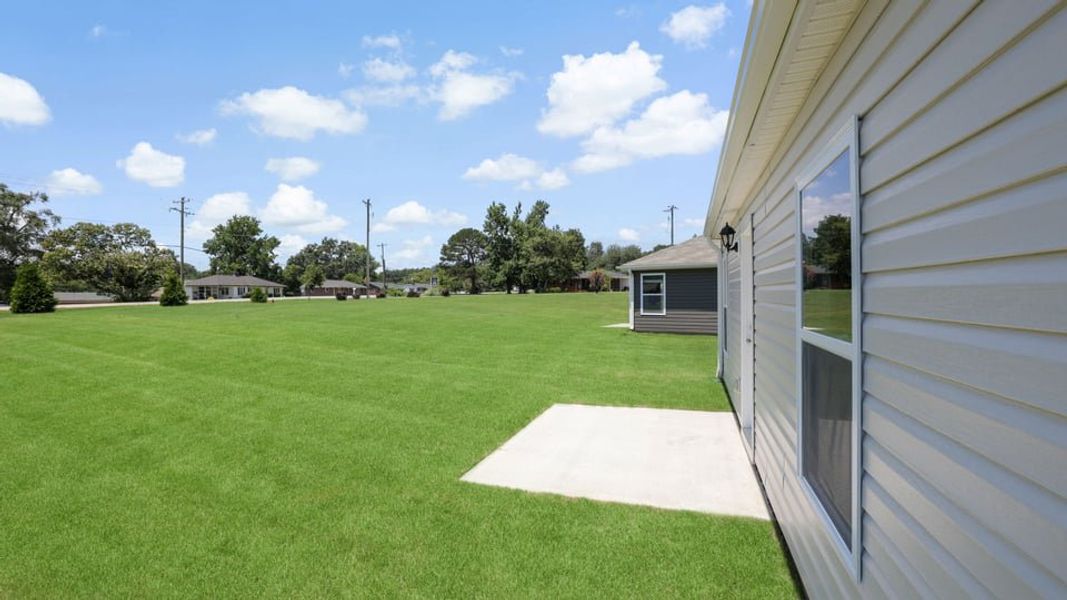Exterior details and patio area of a home in Harper Ridge, Roebuck (Image 21).