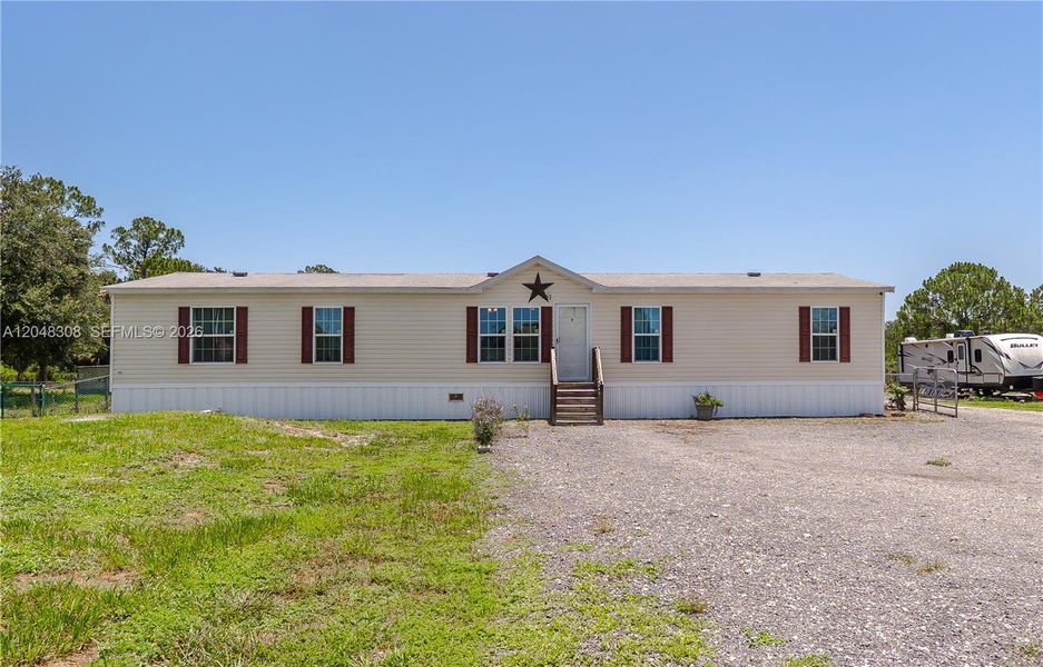 Exterior details and patio area of a home in , Clewiston (Image 29). Exterior details and patio area of a home in , Clewiston (Image 29).